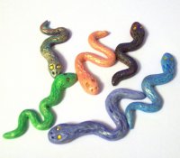 Подарок на Новый  год своими руками: змея из полимерной глины